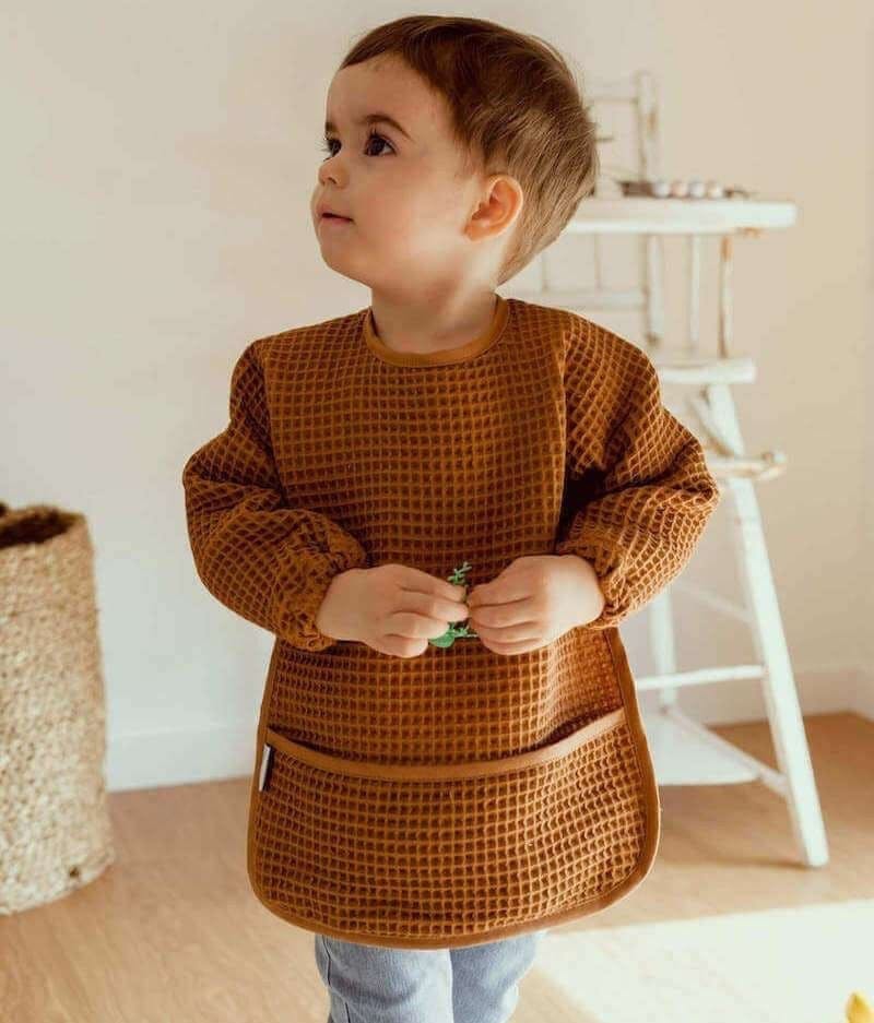 Bavoir à manches nid d’abeille